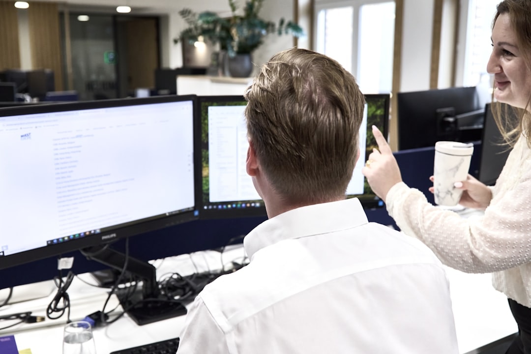 Finance team discussing expense management system implementation